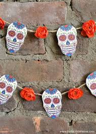 From your fireplace mantel to your nightstand, learn how to decorate your home with skulls in the most stylish way. Diy Sugar Skull Banner With Free Printable And Tutorial Hello Little Home