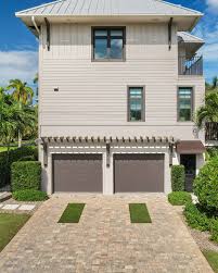 Experience the charm of downtown Naples in this stunning coastal retreat.  Perfectly located near the vibrant shopping, dining, and waterfront  attractions Naples is known for, this home seamlessly blends luxury and  convenience.