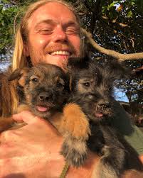 Thinkin' about these scruffy muffins today I was the only guest at this  hotel the whole two weeks I stayed there, but they had twin puppies,  unlimited coffee, & back porch waves -