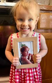 My mama passed away in 2017 from an aggressive type of brain cancer known  as Glioblastoma. She never got the chance to meet my babies. Yesterday,  Khloe discovered my mom's picture that