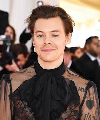 How does he get his hair like that? Harry Styles With A Mustache Is Causing A Viral Debate
