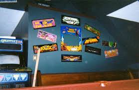 Using Arcade Game Marquee As Wall Art In The Garage Garage Decor Garage Redesign Garage Walls