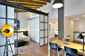 This renovated 1961 apartment brilliantly combines a retro 50s look with an industrial style in a project. Industrial Apartment Hotel Bosch Palma De Mallorca