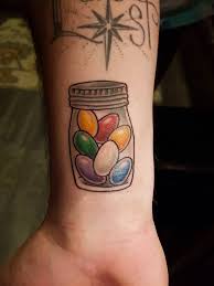 The tattoos are packed 300/box, and one box normally fills one column of a sticker or tattoo vending machine. Rainbow Jellybeans Done By Sharky Jones At Ironside Tattoo In Charlottetown Pei Tattoos
