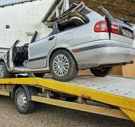 The Different Types of Flatbed Tow Trucks: Rollback vs ...