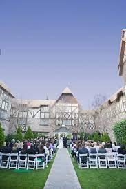 An Elegant Outdoor Setting Fit For A Royal Wedding In Sunny Anaheim Surrounded By Lush Greens And Florals With A Backdrop Of Regal Ston Anaheim Wedding Venues