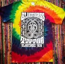We opened our first tattoo shop, starting small in a strip mall in the spring, and we were married that fall. Naga Tie Dye T Shirt Bluegrass Tattoo Custom Tattoos Cincinnati Shop