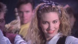 The 80s music icon posed in a black floral bikini, as she held her hands up to her head with a gleeful expression on her face. 80s Teen Pop Idol Debbie Gibson Joins Lucifer S Musical Episode