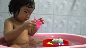 Little Asian Girl Take A Stock Footage Video 100 Royalty Free 1025076617 Shutterstock