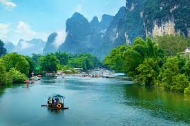 Yulong river has more than 20 scenic spots to explore. Yangshuo Yulong River Landscape Photo Yulong River Bamboo Rafting Easy Tour China