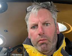 How this adviser with Parkinson's sailed around Ireland to raise money to  find a cure