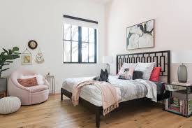 This living room has white tiled flooring topped with a gray rug. Black White And Pink Room Designs