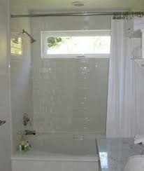 Transom Window Above Bathtub Area To Allow Natural Light Into A Window In Shower Bathroom Remodel Cost Bathroom Windows In Shower