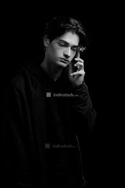We did not find results for: Young Guy In A Black Hoodie On A Black Background With A Mobile Phone In His Hands People Indivstock
