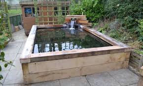 Raised Koi Pond Design Picture 1000x600 Jpg 1000 600 Koi Fish Pond Pond Design Koi Pond Design