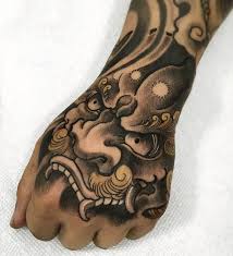 Black And Grey Foo Dog Hand Tattoo Japanese Style Brand Tattoo By Fibs Art Japanese Hand Tattoos Japanese Tattoo Tattoo Japanese Style