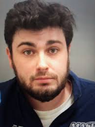 Scituate man charged after driveway accident