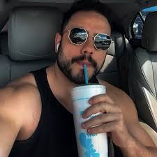 Which exterior color is preferred for a 2024 GMC Acadia AT4, Summit White  or White Frost Tricoat?