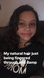 Posing with my natural hair. Yes this is my natural curly hair :-)