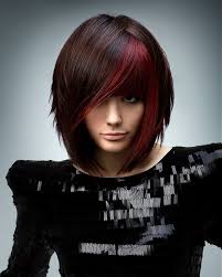 Although peek a boo highlights are the most popular way to incorporate this artful technique into your hairstyle, don't stop there if you like to experiment! Dark Brown Hair With Red Highlights