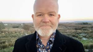 Ian Ogle's 'unparalleled bravery' recalled at Belfast funeral