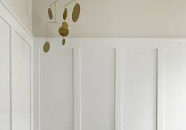 This is a twist on a board and batten, which basically means putting wood strips on your wall in a pattern. How We Installed Easy Board Batten At The Beach Young House Love