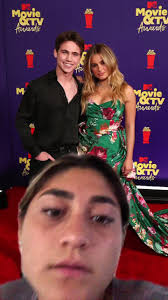 Tanner Buchanan and Addison Rae Kiss at The Awards