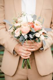 Bridesmaids will look great in cornflower blue, and can add neutral accessories and maybe a splash of bronze or rose gold to finish the look. 8 Grey And Peach Wedding Bouquets Peach Wedding Bridal Bouquet