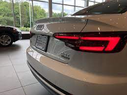 Rear Angled View Of 2018 Audi A4 In Ibis White Vehicle Located At Audi F Bridgewater Nj Audi Dealership Audi Used Luxury Cars