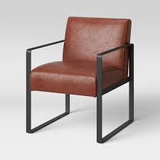 The dark grey color suits most color palettes and complements the espresso finish of the legs. Kino Metal Arm Accent Chair Caramel Faux Leather Project 62 In 2021 Accent Chairs Leather Lounge Chair Leather Accent Chair