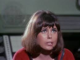 The unknown ensign's fame is due to her iconic red shirt