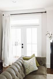 Neutral Living Room Draperies Puddled Curtains Help Keep The Space Warm In The Winter And Cool In The Home Furniture Design Living Room Living Room Draperies