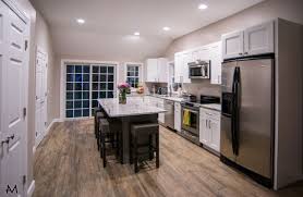 Our Kitchen Pretoria White Granite Tile Wood Floors White Perimeter Cabinets Dark Gray Island Wall Paint Shar Home Depot Colors Wood Tile Floors Home