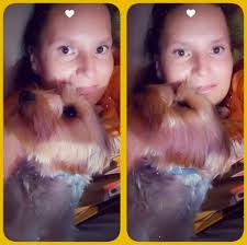 Love comes in small (and furry) packages 💋🐾 #YorkieKisses”