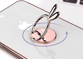 I made this little ring holder bunny as a bridal shower gift for a friend~ the eyes were handpainted after sculpting was finished, and i gave her a big purple bow (her favorite color) to finish it off. Bunny Phone Ring Holder Pop Socket Grip Phone Holder Ring Etsy Popsockets Phone Ring Ring Pop