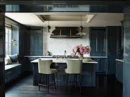 • dark kitchens are often considered to be more dramatic and sophisticated than light kitchens. Glossy Blue Kitchen Cabinets With Horizontal White Marble Tiles Contemporary Kitchen