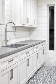 A Modern Farmhouse Utility Room In Austin Texas In 2020 Grey Kitchen Floor Gray Kitchen Countertops Kitchen Cabinets Grey And White