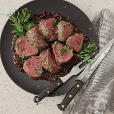 A beef tenderloin roast with pinot noir sauce. Slow Roasted Beef Tenderloin With Red Wine Mushroom Sauce Recipe Cart