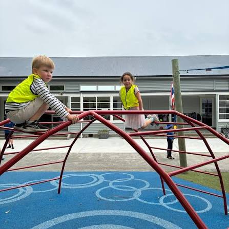 Children learning together in bright classroom
