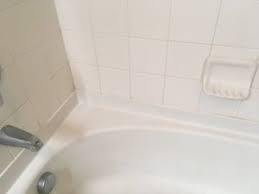 If you're caulking woodwork to prepare it for paint, start with the opening very small, just over 1/16 in. Re Caulk Your Bathroom In 5 Easy Steps Basement Finish Pros