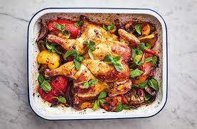 Remove the gnarly chicken from the pan and go in with the tomatoes, chopped chillies and cashew butter. Jamie Oliver S 5 Ingredient Harissa Chicken Traybake Moroccan Recipes Goodtoknow