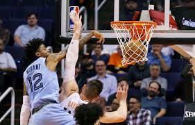 Ja morant dunk ja morant murray state s scoring dunking. Photos And Ja Morant S Reaction To His Poster Dunk Against Phoenix Suns Epicbuzzer