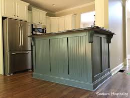Some trademark characteristics of shaker kitchen cabinets include flat paneled doors with rail frames, sturdy construction with quality wood, and utilitarian designs. Adding Beadboard To The Bar Southern Hospitality