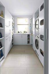 through the kitchen cupboard into the pantry kitchen and utility room by leicht schuller and siematic wasruimte design wasruimte keuken wasruimte inrichten