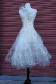 This A 120 Plastic Water Bottle Dress Made By 17 Year Old Jenny Chen Who Is Going To Fashion School This Su Recycled Dress Recycled Fashion Recycled Costumes