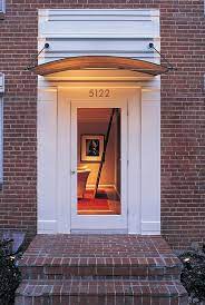 Add Decors To Your Exterior With 20 Awning Ideas Home Design Lover Front Door Awning Door Awnings Front Door Canopy