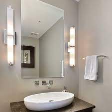 So, you have to be very careful in deciding the right light fixture for your bathroom. How To Light A Bathroom Vanity Ylighting Ideas Modern Bathroom Lighting Bathroom Vanity Designs Modern Bathroom