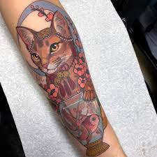 As with all tattoos, cat tattoos became common as people wanted to have them for the different depending on the culture, cat tattoos were used for luck, spirituality, endearment and many more. Tattoo Uploaded By Hannah Flowers Tattoo By Hannah Flowers Hannahflowers Neotraditional Artnouveau Color Painterly Portrait Cat Petportrait Goldfish Bells Pearls Cherryblossom Moon 652281 Tattoodo