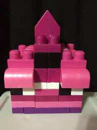 It is like a castle complex that takes place on an island. Mega Blocks Princess Castle Mega Blocks Pearler Bead Patterns Pattern Blocks
