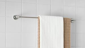 Beautiful bathroom design with wood vanity and recessed shelving for storage space Towel Racks Bathroom Towel Bars Holders Ikea